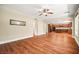 Open-concept living area with hardwood floors seamlessly connecting to the kitchen at 505 Los Dolces St, Las Vegas, NV 89138