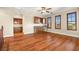 Upstairs living room with bar, wood floors, natural light, and neighborhood views at 505 Los Dolces St, Las Vegas, NV 89138