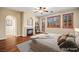 Serene main bedroom with fireplace, balcony access, and shuttered windows at 505 Los Dolces St, Las Vegas, NV 89138