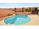 Sparkling pool with lush landscaping provides a tranquil backyard oasis at 505 Los Dolces St, Las Vegas, NV 89138