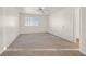 Bedroom featuring neutral carpeting, a ceiling fan, and a window with blinds at 510 Crumpler Pl, Henderson, NV 89052