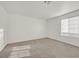 Neutral carpet, window with blinds in this bright bedroom with white walls at 510 Crumpler Pl, Henderson, NV 89052