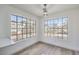 Dining area with large windows and modern light fixture at 5216 Las Cruces Dr, Las Vegas, NV 89130