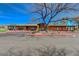 Clubhouse entrance with lush landscaping, palm trees and well-maintained grounds at 524 Turtleback Rd # A, Mesquite, NV 89027