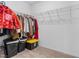 Walk-in closet featuring wire shelving, storage boxes, and ample space for organizing clothes at 5398 Pico Viejo St, Las Vegas, NV 89166