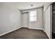 Bedroom boasts tile flooring, neutral walls, and natural light at 5575 Cresent Valley St, Las Vegas, NV 89148