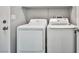 Bright laundry room features a washer and dryer at 5575 Cresent Valley St, Las Vegas, NV 89148