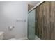 Updated bathroom with modern shower and tiled wall at 5816 W Cherokee Ave, Las Vegas, NV 89103