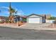 Charming single-story home with a two car garage and low maintenance desert landscaping at 5816 W Cherokee Ave, Las Vegas, NV 89103