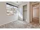 A bedroom featuring a closet with sliding doors and a large window at 639 Grey Saker St, Las Vegas, NV 89138