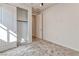 A bedroom featuring a closet with sliding doors, neutral walls and plush carpet at 639 Grey Saker St, Las Vegas, NV 89138