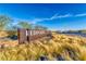 Redpoint community entrance sign amid natural desert landscaping against a clear sky at 639 Grey Saker St, Las Vegas, NV 89138