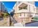 Contemporary three-story townhouse showcasing modern architecture and landscaped surroundings at 639 Grey Saker St, Las Vegas, NV 89138