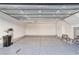 Spacious two car garage with epoxy floor and ample overhead storage at 639 Grey Saker St, Las Vegas, NV 89138