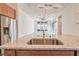 Granite countertop on kitchen island overlooking living room at 639 Grey Saker St, Las Vegas, NV 89138