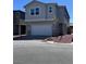 Charming two-story home featuring a two-car garage and a well-maintained front yard at 6616 Bowery St, Las Vegas, NV 89148
