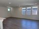 Bright living room features recessed lighting and large windows for plenty of natural light and scenic views at 6616 Bowery St, Las Vegas, NV 89148