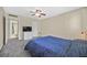 The bedroom has a TV, a closet door, and ensuite bathroom access for added convenience at 668 Oakmont Ave # 1724, Las Vegas, NV 89109