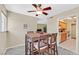 Cozy dining area featuring a ceiling fan and seamless access to the adjacent kitchen at 668 Oakmont Ave # 1724, Las Vegas, NV 89109