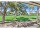 Scenic golf course view with mature trees and lush green grass extending into the distance at 668 Oakmont Ave # 1724, Las Vegas, NV 89109