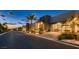 Street view of modern homes featuring desert landscaping, and clean architectural lines at 678 Blackrock Rim Dr, Henderson, NV 89012