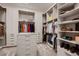 Well-organized walk-in closet featuring custom shelving and ample storage space at 678 Blackrock Rim Dr, Henderson, NV 89012