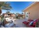 This outdoor balcony offers relaxing seating arrangements and a view of the neighborhood at 75 Luce Del Sole # 3, Henderson, NV 89011