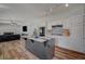 Kitchen with a central island that opens to the living room at 7650 Hartwell Dr, Las Vegas, NV 89123