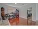 Cozy living room featuring laminate flooring and an open doorway to another room at 7650 Hartwell Dr, Las Vegas, NV 89123