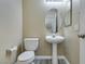 Cozy half bathroom featuring a pedestal sink and neutral wall color at 7752 Orchard Wood Ct, Las Vegas, NV 89131