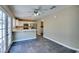 Bright modern kitchen featuring stainless steel appliances and a stylish breakfast bar with marble countertop at 7752 Orchard Wood Ct, Las Vegas, NV 89131