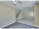 Spacious living room featuring hardwood floors and staircase leading to the second floor at 7752 Orchard Wood Ct, Las Vegas, NV 89131