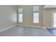 Bright living room featuring high ceilings, neutral walls, luxury vinyl plank flooring, and elegant decor at 7752 Orchard Wood Ct, Las Vegas, NV 89131