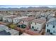 Expansive aerial view of a residential community with mountain views and private backyards at 7970 Calito St, Las Vegas, NV 89166