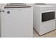 White, front-loading Whirlpool washer and dryer set at 7970 Calito St, Las Vegas, NV 89166