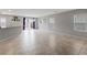 Expansive living room featuring tile flooring and abundant natural light at 7970 Calito St, Las Vegas, NV 89166