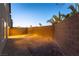 Spacious fenced backyard provides privacy and room for outdoor activities and landscaping opportunities at 8012 Carpenter Creek Ave, Las Vegas, NV 89113