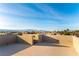 Rooftop patio with views of the mountains in the distance provides an ideal outdoor retreat at 8012 Carpenter Creek Ave, Las Vegas, NV 89113