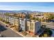 Scenic street view showcasing modern townhomes in a vibrant community with mountain views at 8012 Carpenter Creek Ave, Las Vegas, NV 89113