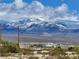 Snow-capped mountains under a partly cloudy sky at 81 W Mesquite Ave, Pahrump, NV 89060