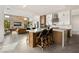 Modern open kitchen with island and bar stool seating at 826 Willits St, Las Vegas, NV 89138