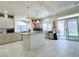 Bright open kitchen with an island, marble countertops and stainless steel appliances at 8573 Silver Coast St, Las Vegas, NV 89139