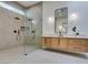 Modern bathroom with dual rain showers and sleek floating vanity at 8649 Robinson Ridge Dr, Las Vegas, NV 89117