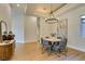 Modern dining room with elegant chandelier and decorative buffet at 8649 Robinson Ridge Dr, Las Vegas, NV 89117