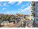 Expansive view from balcony of hotel and surrounding landscaped areas at 9103 Alta Dr # 404, Las Vegas, NV 89145