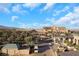 Overhead view from balcony featuring landscaping, trees, and parking at 9103 Alta Dr # 404, Las Vegas, NV 89145