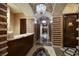 Elegant hallway featuring marble accents, arched doorways, and decorative lighting at 9103 Alta Dr # 404, Las Vegas, NV 89145