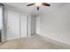 Bedroom featuring a closet with sliding doors and carpet flooring at 9278 Hainsworth Ave, Las Vegas, NV 89148