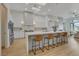 Bright kitchen with a large center island, pendant lights, stainless steel appliances, and an open layout at 1 Club Vista Dr, Henderson, NV 89052