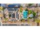 Aerial view of the property featuring a backyard pool, covered patio, and solar panels at 10233 Madison Grove Ave, Las Vegas, NV 89166